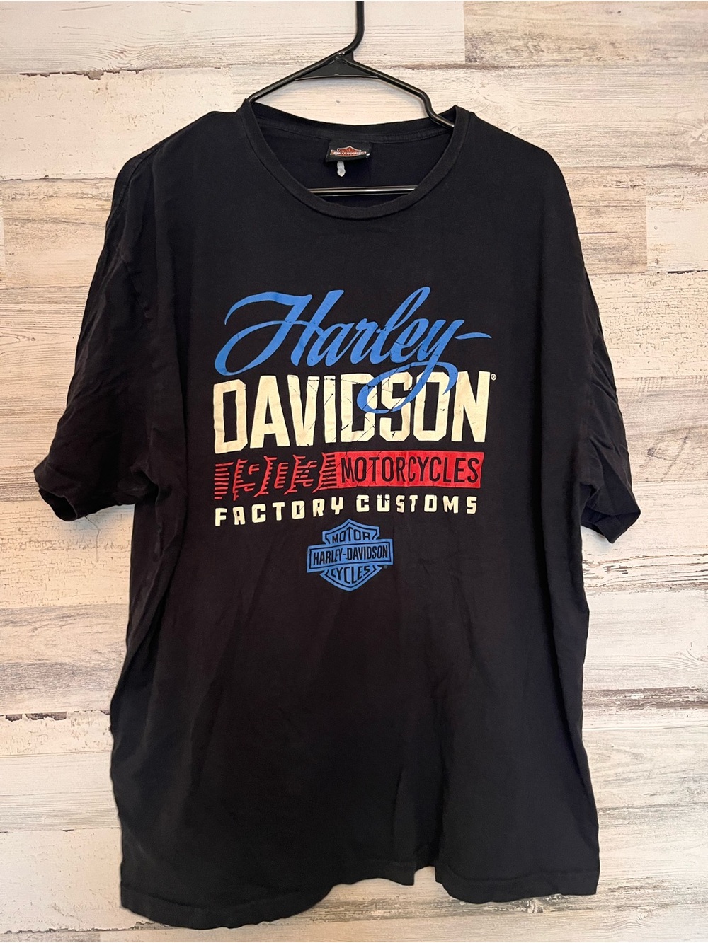 Harley-Davidson Black T-Shirt with Blue, Cream, and Red Logo